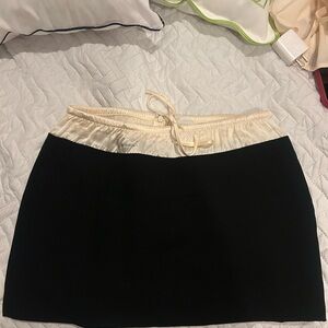 Elegant Black and Cream Reformation Skirt